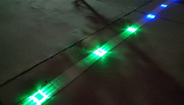 Solar road studs illuminate the road at night